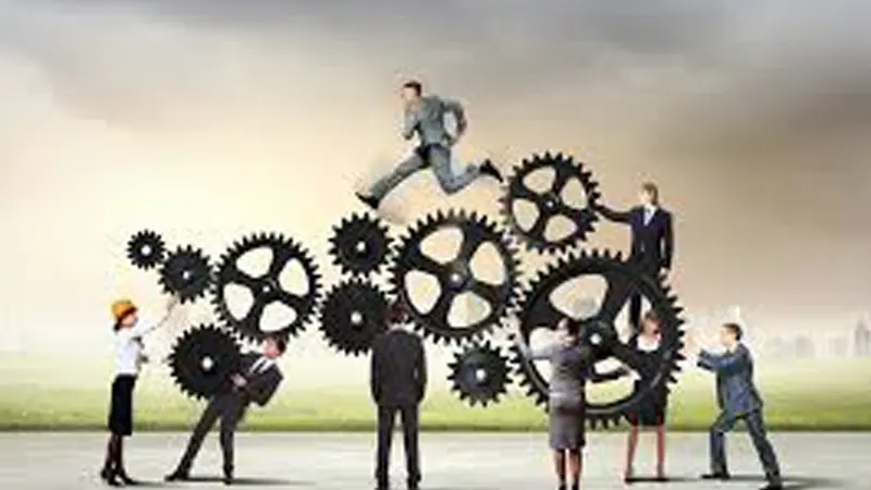 Engineers collaborating on a project in a modern office setting